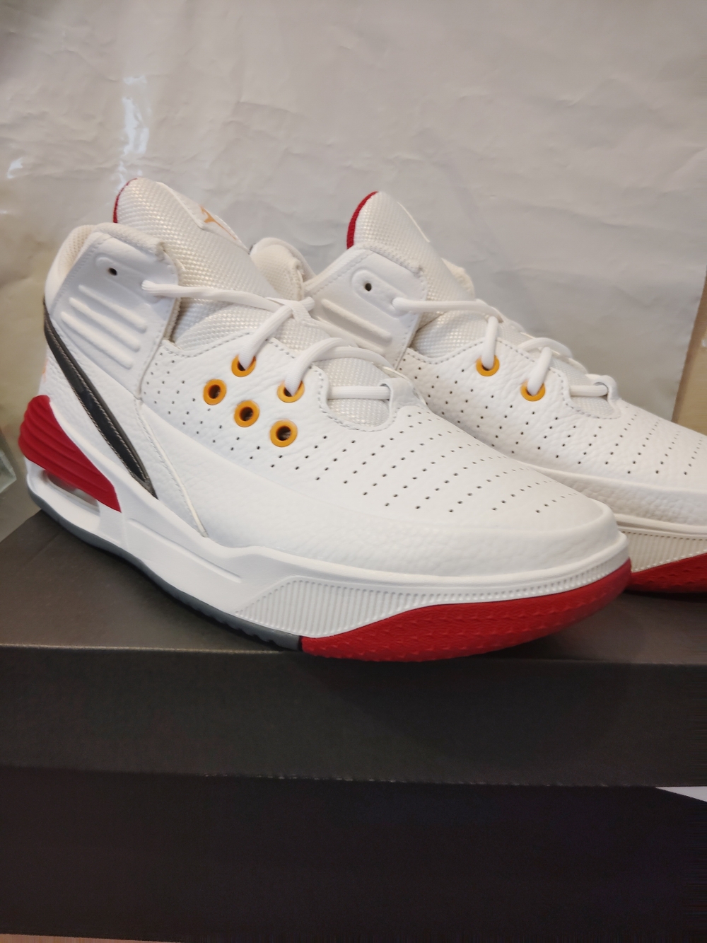 Nike White Sneakers with Red and Gold Accents